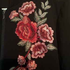 Lipslide, black zip up jacket